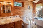 Updated master bathroom with deep soaking tub and amazing views